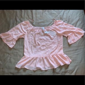 Candie’s off the shoulder top